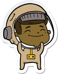 Obraz premium sticker of a happy cartoon astronaut