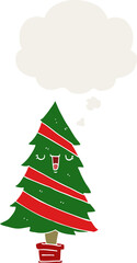 cartoon christmas tree with thought bubble in retro style