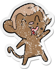 distressed sticker of a crazy cartoon monkey