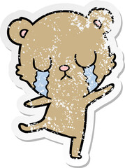 distressed sticker of a crying cartoon bear doing a sad dance