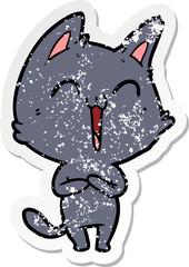 distressed sticker of a happy cartoon cat