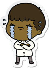 sticker of a cartoon man crying