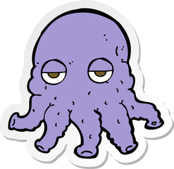 sticker of a cartoon alien squid face