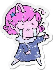 distressed sticker of a cartoon crying alien girl