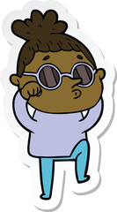 sticker of a cartoon woman wearing sunglasses