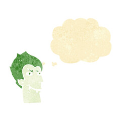 cartoon vampire face with thought bubble