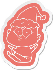 quirky cartoon  sticker of a bald man staring wearing santa hat