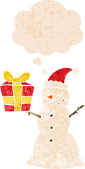 cartoon snowman with present with thought bubble in grunge distressed retro textured style