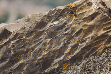 Texture cracked rock formation rock in the wild. Rocky cliff. Abstract Stone texture. Steep cliff...