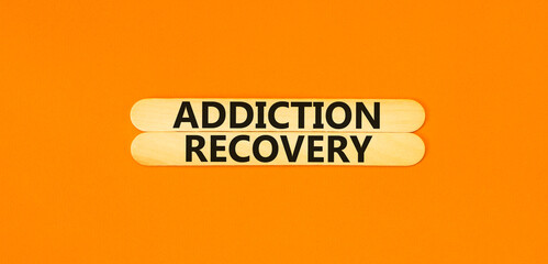 Addiction recovery symbol. Concept words Addiction recovery on beautiful wooden stick. Beautiful...