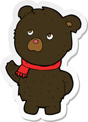 sticker of a cartoon cute black bear