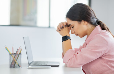 Unhappy tired young arab lady manager with computer suffer from mistake, work problems