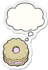 cartoon biscuit with thought bubble as a printed sticker
