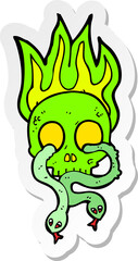 sticker of a cartoon skull with snakes