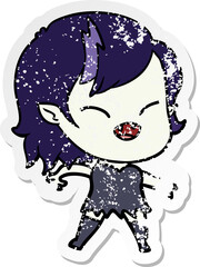 distressed sticker of a cartoon laughing vampire girl