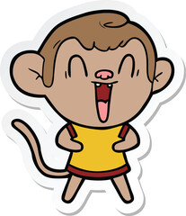 sticker of a cartoon laughing monkey