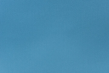 Matte leather texture in steelblue color, background.