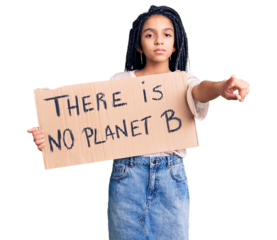 Cute african american girl holding there is no planet b banner pointing with finger to the camera and to you, confident gesture looking serious
