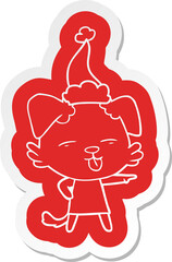 quirky cartoon  sticker of a dog sticking out tongue wearing santa hat