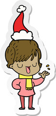 hand drawn sticker cartoon of a woman talking wearing santa hat
