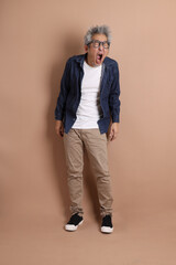 Fototapeta premium Asian energetic senior man