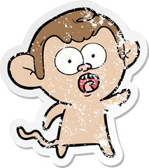 distressed sticker of a cartoon shocked monkey