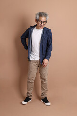 Fototapeta premium Asian energetic senior man