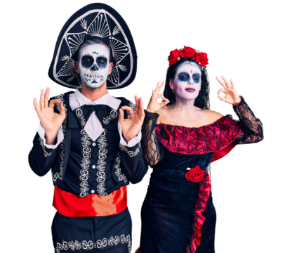 Young couple wearing mexican day of the dead costume over background relaxed and smiling with eyes closed doing meditation gesture with fingers. yoga concept.
