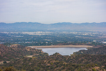 Obraz premium Views from Dirt Mullholland Dr in the Santa Monica Mountians looking North in the San Fernando Valley on a clear sky winter day.