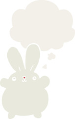cute cartoon rabbit with thought bubble in retro style