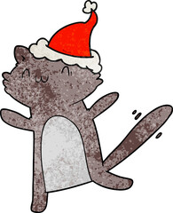 hand drawn textured cartoon of a dancing cat wearing santa hat