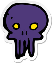 sticker of a cartoon spooky skull symbol