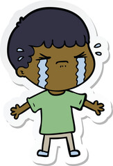 sticker of a cartoon man crying