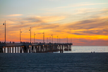 Fototapeta na wymiar Sunset at the Venice Beach Fishing Pier in Los Angeles, CA