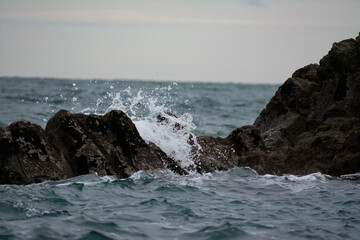 waves crashing on rocks