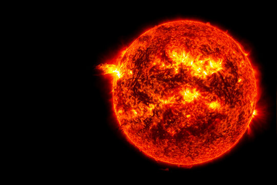 The sun on a dark background in space. Elements of this image furnished by NASA