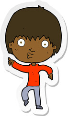 sticker of a cartoon impressed boy pointing