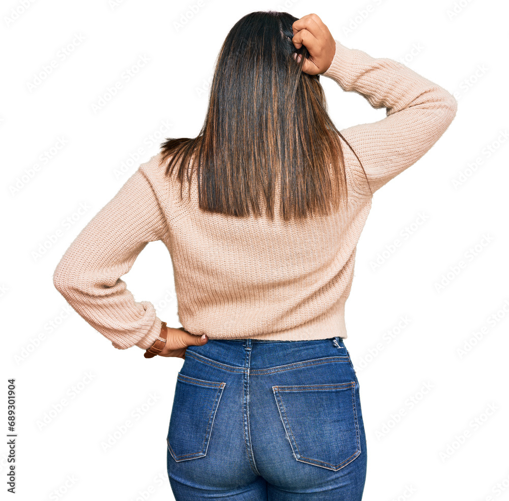 Poster Young latin girl wearing wool winter sweater backwards thinking about doubt with hand on head