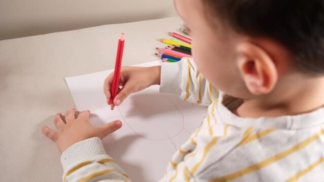 child drawing a picture