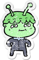 distressed sticker of a friendly cartoon spaceman