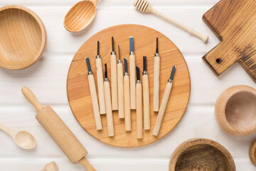 Carpenter tools with wooden objects on table ,top view