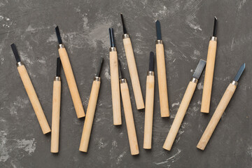 Carpenter tools on concrete background,top view