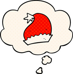 cartoon santa hat with thought bubble in comic book style