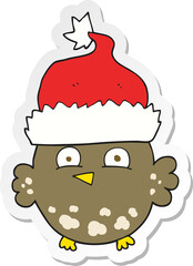 sticker of a cartoon owl wearing christmas hat