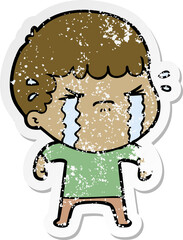 distressed sticker of a cartoon man crying