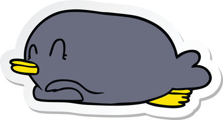 sticker of a penguin lying on belly