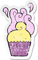 retro distressed sticker of a cartoon cupcake