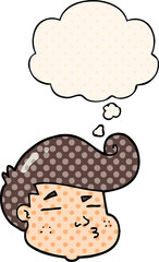 cartoon boy's face with thought bubble in comic book style