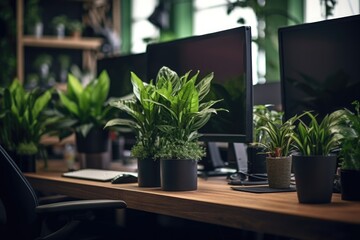 A desk featuring two computer monitors and two potted plants. Perfect for office and workspace...