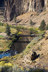 Visitors Cross Pedestrain Bridge